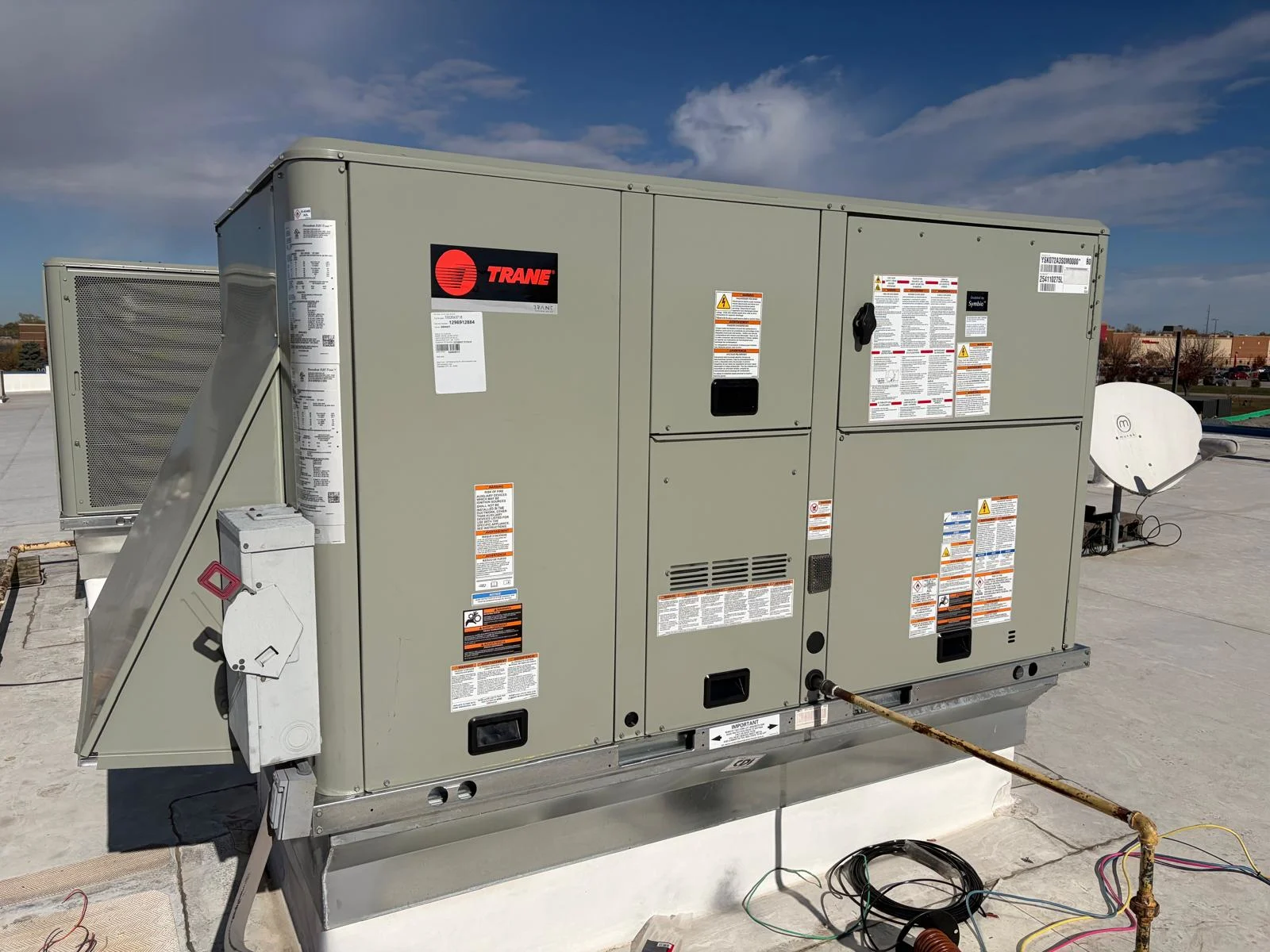 Trane commercial rooftop HVAC package unit close-up installation
